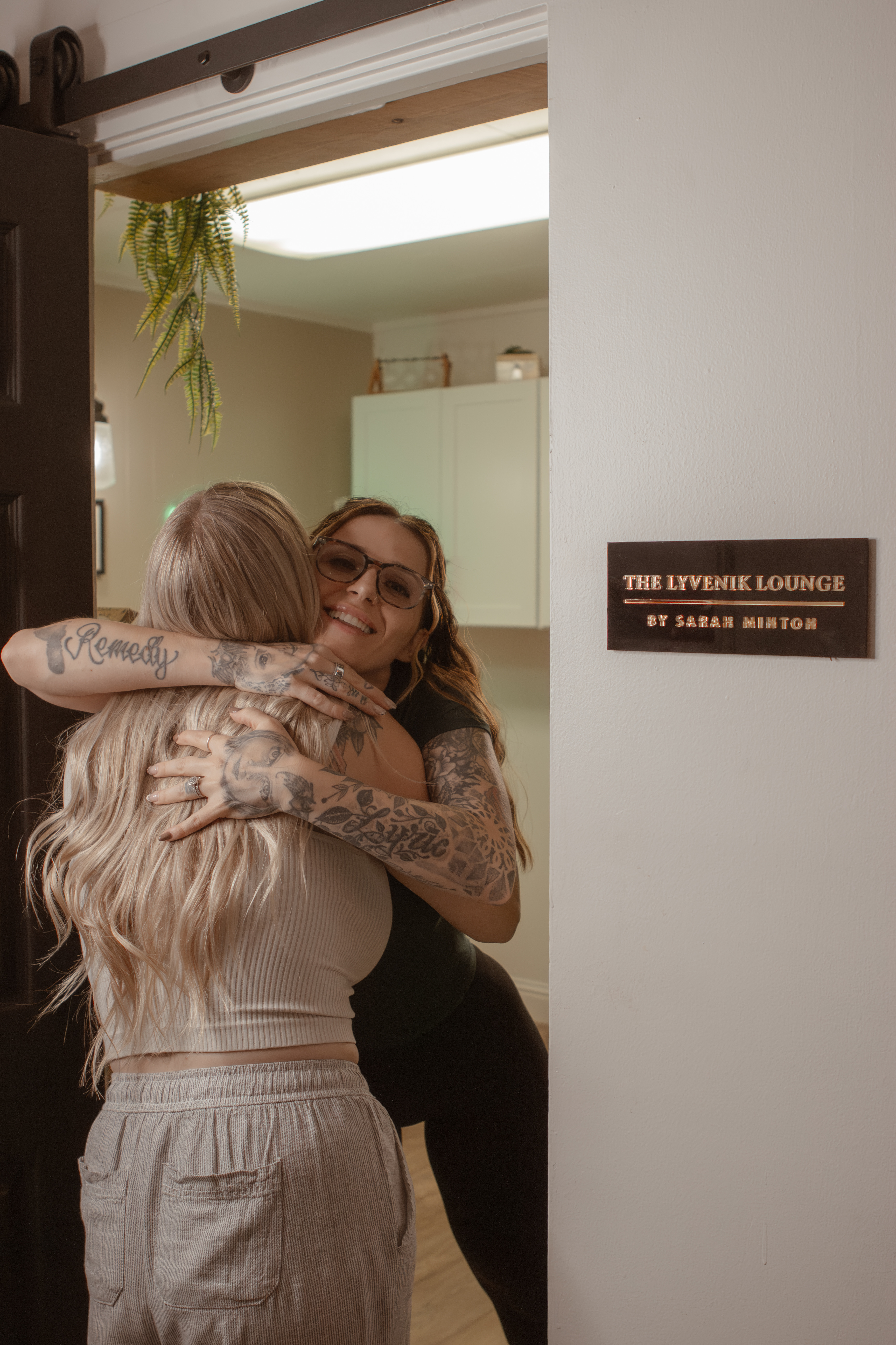 Sarah welcoming a client at The Lyvenik Lounge